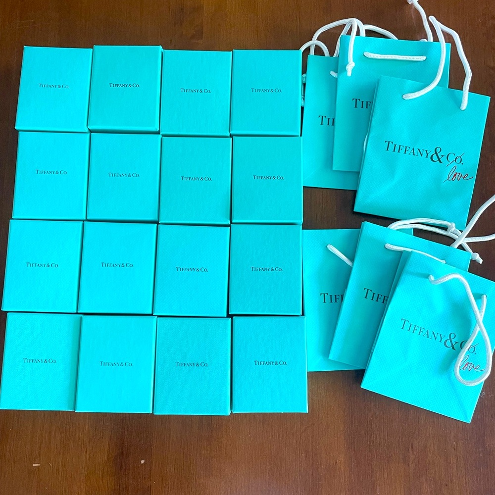 Tiffany & Co. boxes 16 with pouches inside and six bags. Boxes are empty.
